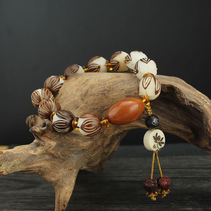 Buddha Stones Tibetan Mala White Bodhi Seed Peace Bracelet - Bodhi Seed & Olivary Nucleus (Wrist Circumference: 16-18cm) - image 1