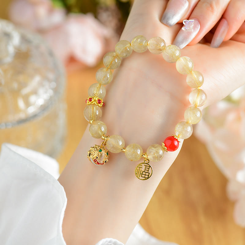 Buddha Stones Natural Golden Rutilated Quartz Fu Character Charm Bell Wealth Bracelet - Rutilated Quartz(Auspiciousness♥Courage)(Wrist Circumference 14-16cm) - image 0