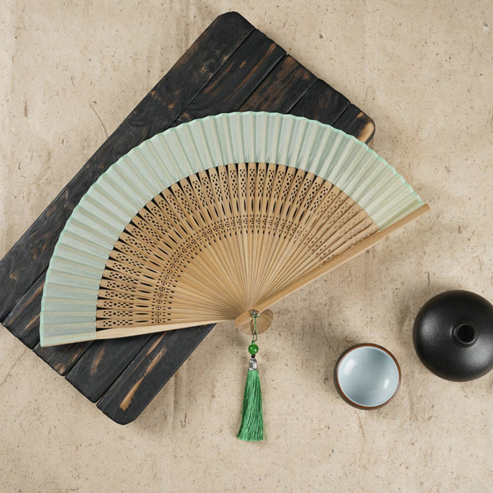 Buddha Stones Simple Cherry Flower Hollow Engraved Handheld Bamboo Folding Fan - Green 22cm - image 0