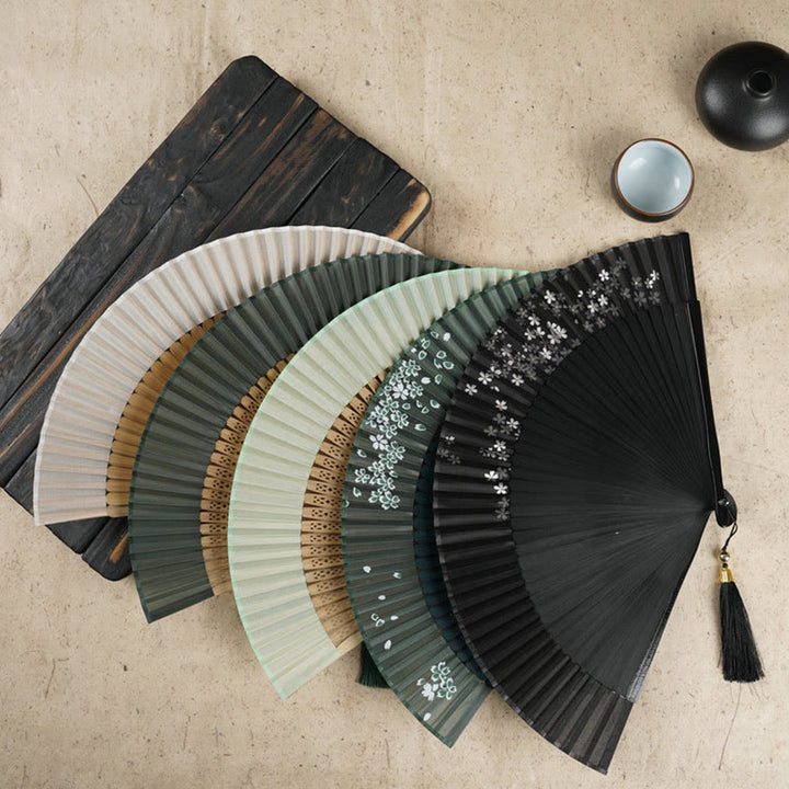 Buddha Stones Simple Cherry Flower Hollow Engraved Handheld Bamboo Folding Fan - image 1