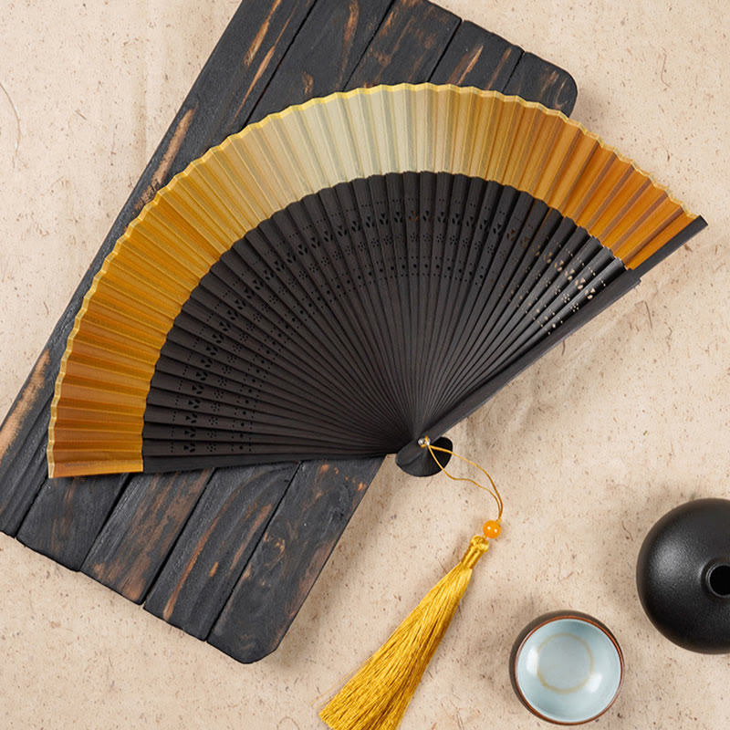 Buddha Stones Solid Color Gradient Hollow Engraved Handheld Bamboo Folding Fan - Yellow Gradient 21.5cm - image 3