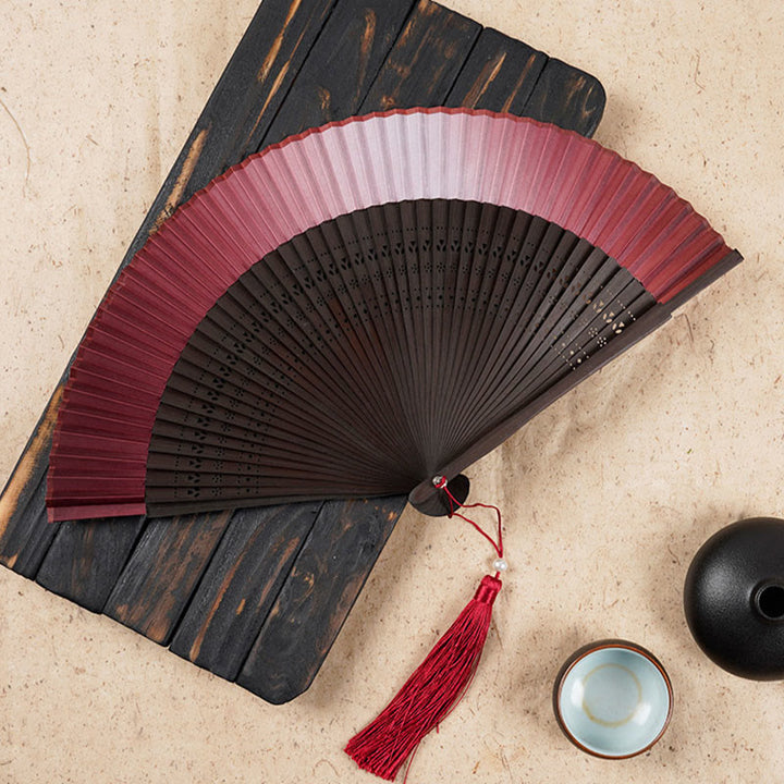 Buddha Stones Solid Color Gradient Hollow Engraved Handheld Bamboo Folding Fan - Red Gradient 21.5cm - image 4