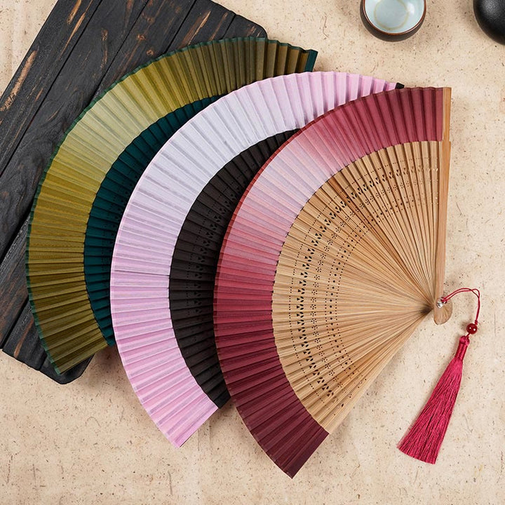Buddha Stones Solid Color Gradient Hollow Engraved Handheld Bamboo Folding Fan - image 0