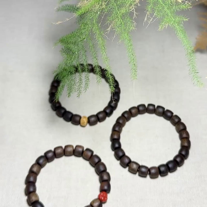 Buddha Stones Nha Trang Rare Bai Qinan Agarwood Cyan Jade Red Agate Laughing Buddha Tibetan Bone Strength Meditation Bracelet