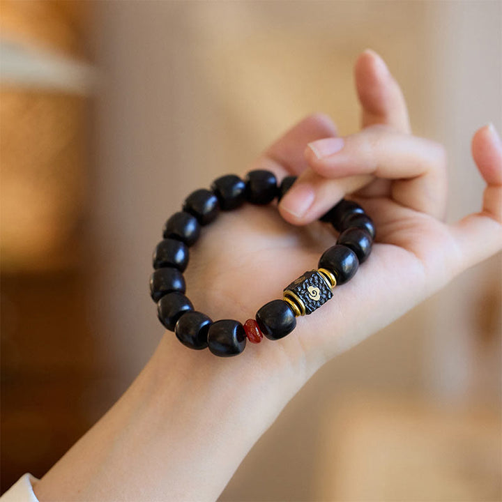 Buddha Stones Ebony Wood Auspicious Clouds Engraved Calm Bracelet