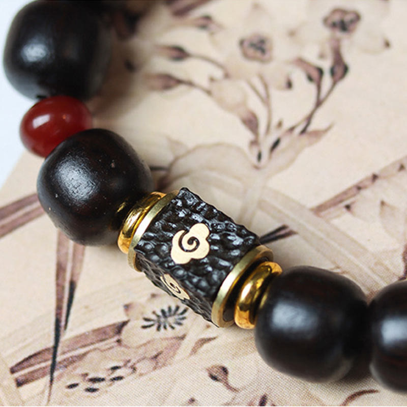 Buddha Stones Ebony Wood Auspicious Clouds Engraved Calm Bracelet