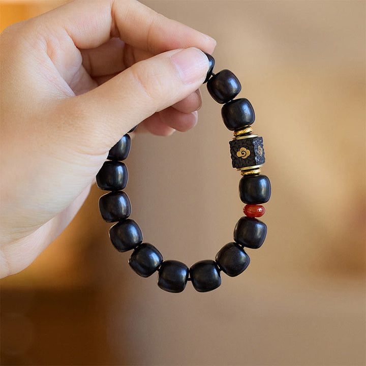 Buddha Stones Ebony Wood Auspicious Clouds Engraved Calm Bracelet