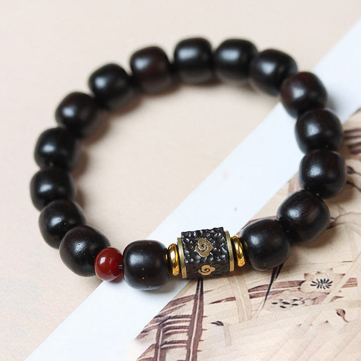 Buddha Stones Ebony Wood Auspicious Clouds Engraved Calm Bracelet