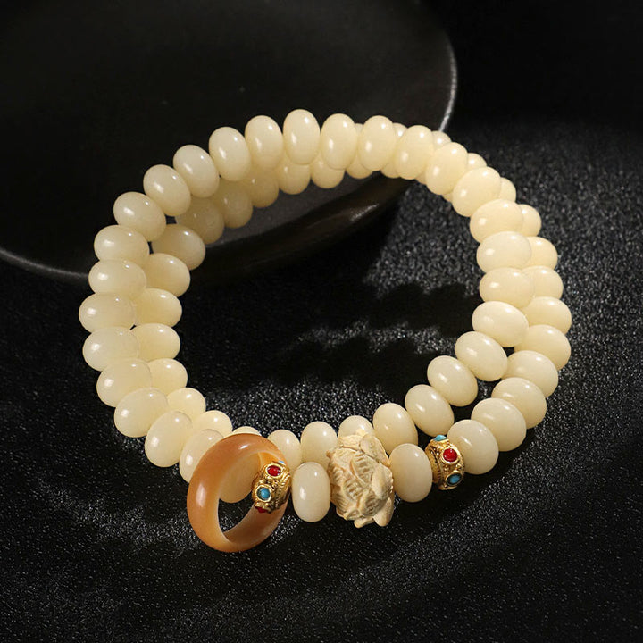 Buddha Stones Bodhi Seed Peach Wood Lotus Wealth Double Wrap Bracelet