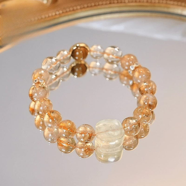 Buddha Stones Topaz Citrine Tiger Eye Zakiram Goddess of Wealth Bracelet