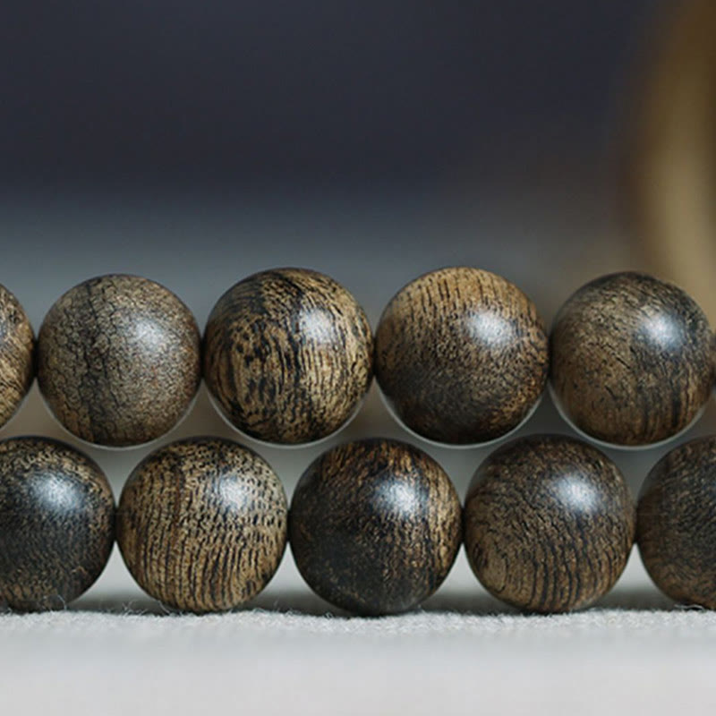 Buddha Stones 108 Mala Beads Natural Tarakan Agarwood Ward Off Evil Spirits Bracelet