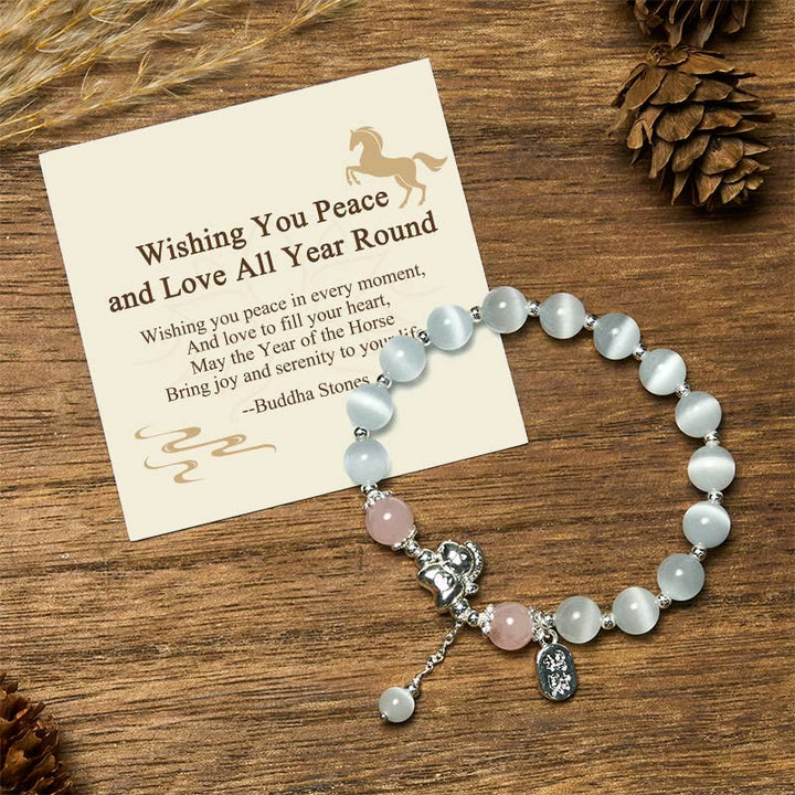 Buddha Stones "Wishing You Peace and Love All Year Round" Year of the Horse Includes Gift Message Card - Cat's Eye Rose Quartz(Wrist Circumference 14-16cm) - Standard Gift Box - image 0