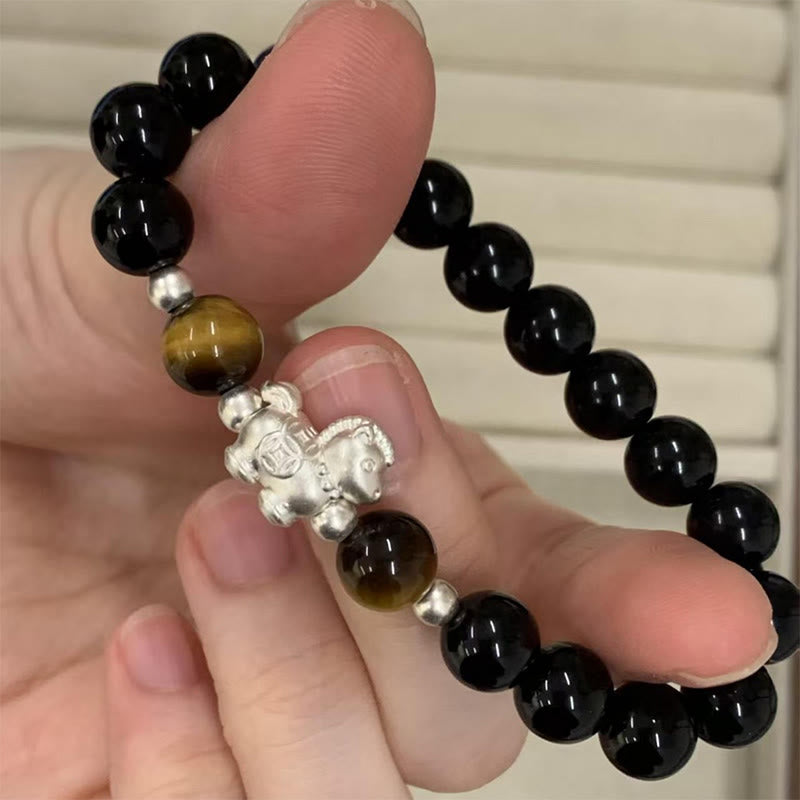 Buddha Stones Year Of The Horse 999 Sterling Silver Horse Charm Black Obsidian Tiger Eye Strength Bracelet - image 1
