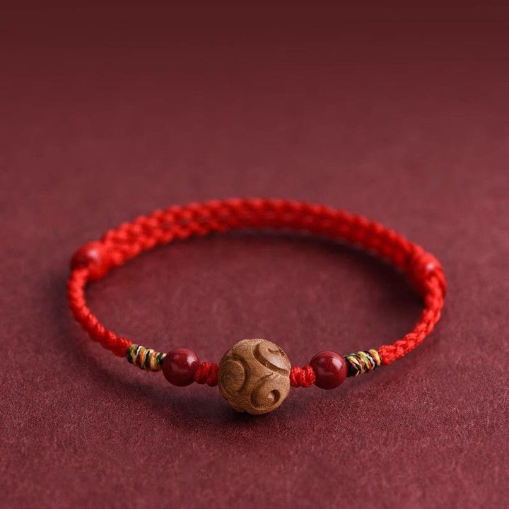 Buddha Stones Carved Auspicious Pattern Natural Peach Wood Rope Luck Bracelet - image 0