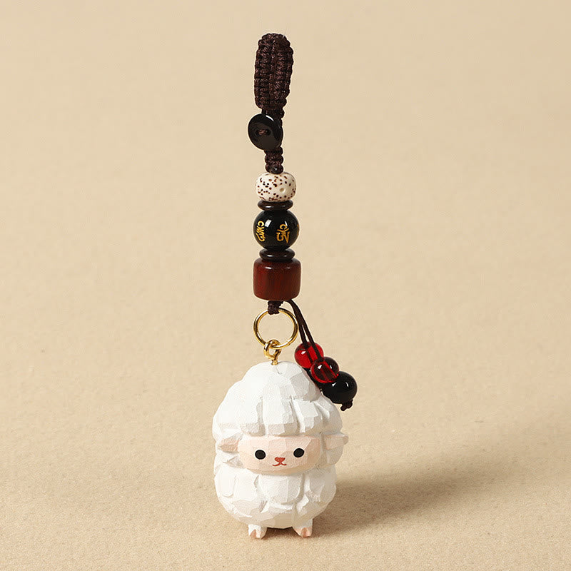 Buddha Stones Chinese Zodiac Linden Wood Engraved Plum Blossom Peace Safe Om Mani Padme Hum Positive Key Chain - Goat 4cm(Color Shape and Size May vary) - Om Mani Padme Hum - image 0