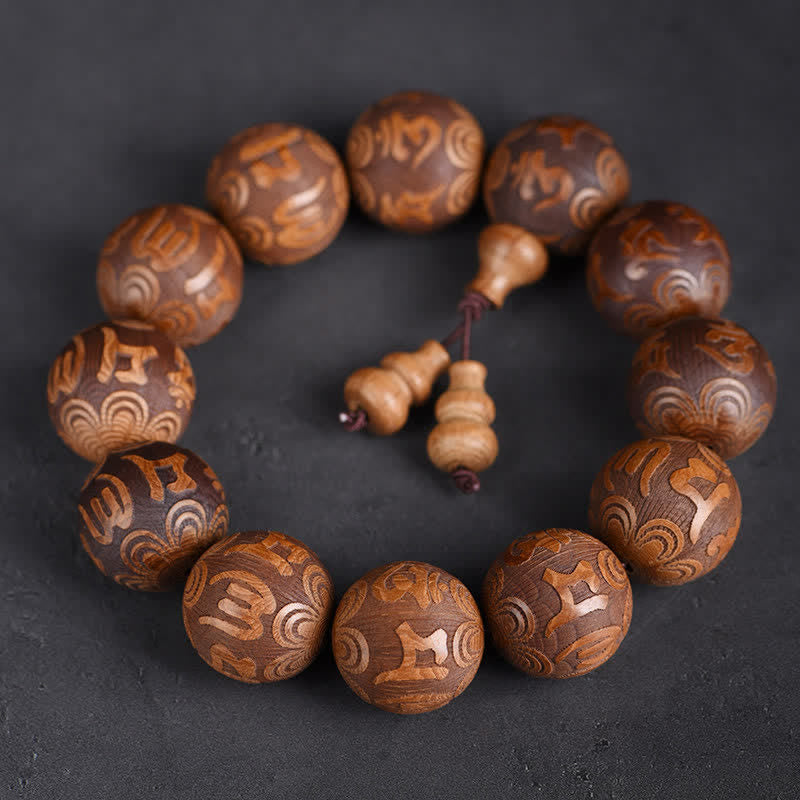 Buddha Stones Natural Abelia Biflora Wood Heart Sutra Om Mani Padme Hum Bracelet - Om Mani Padme Hum - image 0