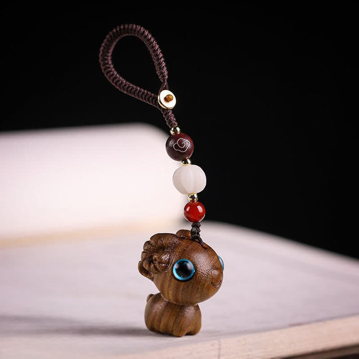 Buddha Stones Green Sandalwood Sheep Luck Hand Carved Keychains - image 1