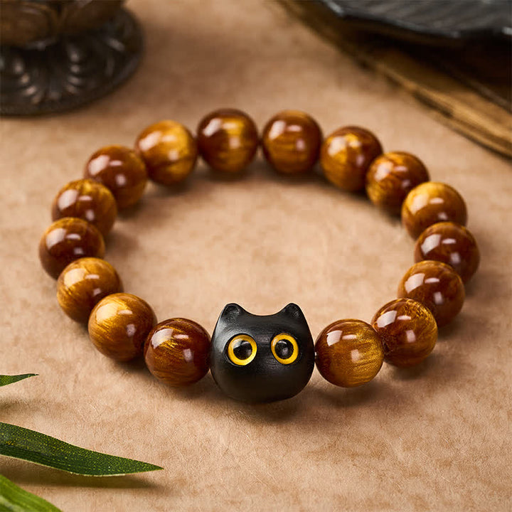 Buddha Stones Yellow Resin Beads Yellow Eyes Ebony Wood Cat Calm Bracelet - image 1