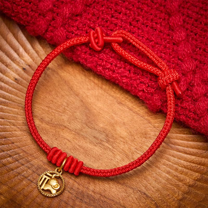 Buddha Stones Elephant Fu Character Gold Plated Copper Red String Wealth Bracelet - image 1