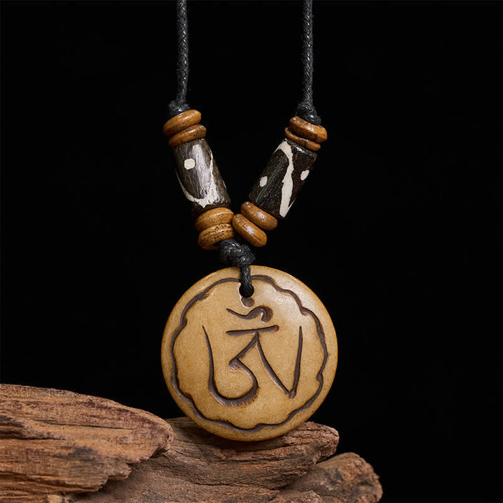 Buddha Stones Bone Bead OM Hand Carved Tibetan Pendant Compassion Necklace - image 1