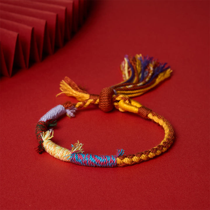 Buddha Stones Cotton Rope Retro Boho Adjustable Tassel Bracelet - Red Yellow Mix - 5.5–6.7 in (14–17 cm) - image 0
