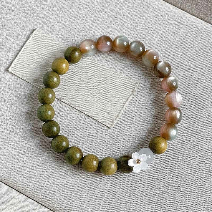 Buddha Stones Green Sandalwood Cat's Eye Flower Charm Serenity Bracelet - 8mm Pink Beads - image 0