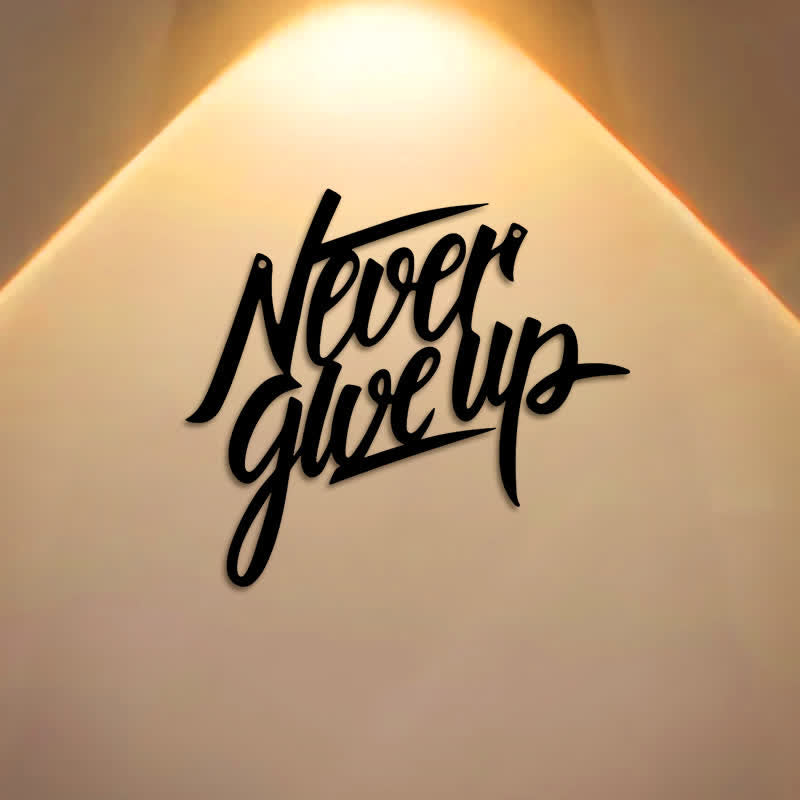 Buddha Stones "Never Give Up" Black Script Iron Metal Wall Decor - image 0
