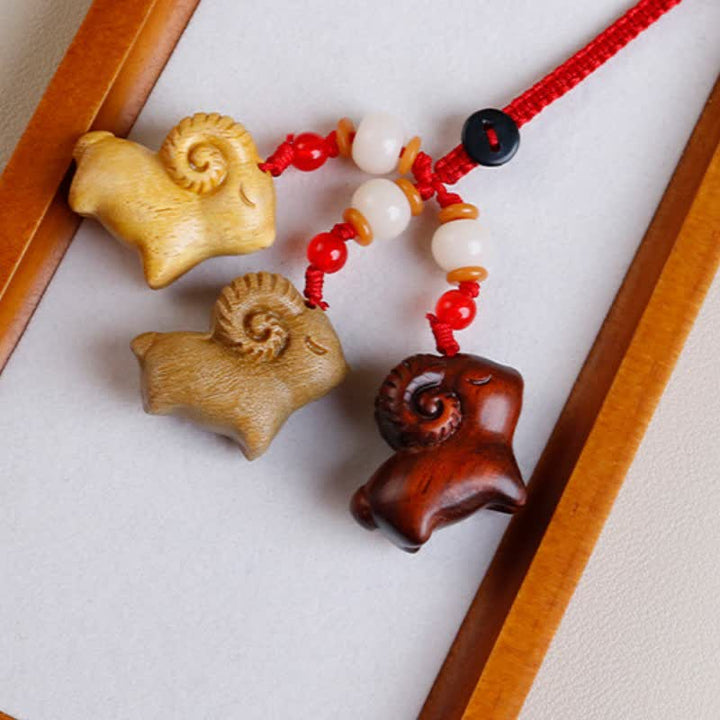 Buddha Stones Hand-Carved Sandalwood Ebony Wood Three Goats Prosperity Keychains - image 2