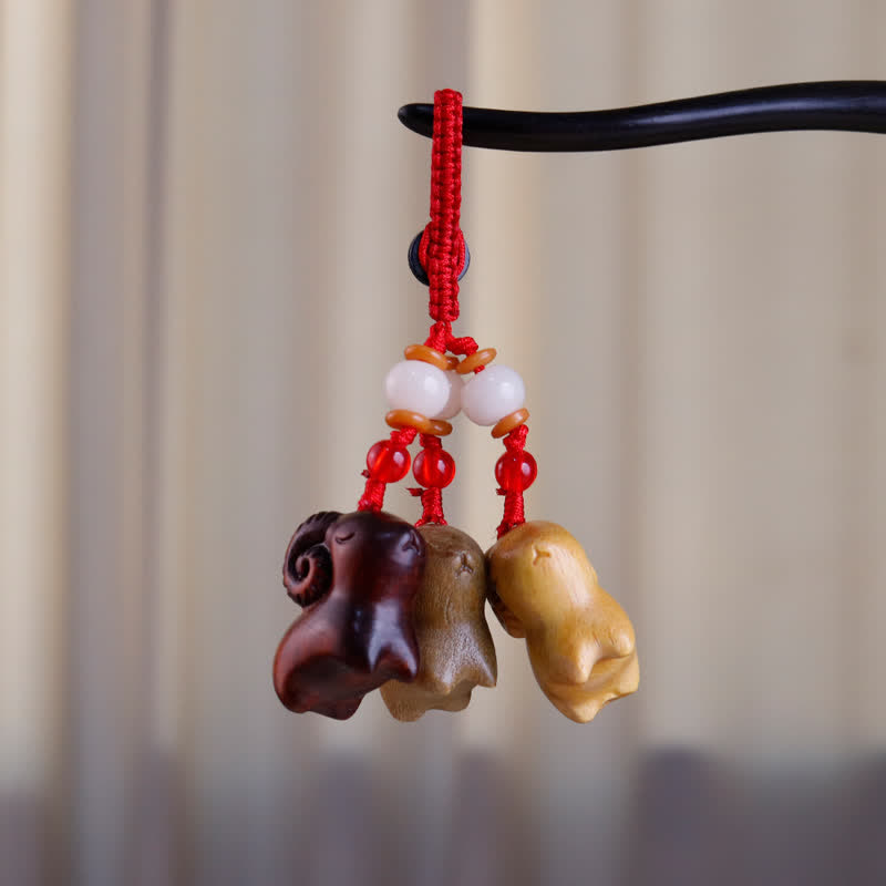 Buddha Stones Hand-Carved Sandalwood Ebony Wood Three Goats Prosperity Keychains - image 3