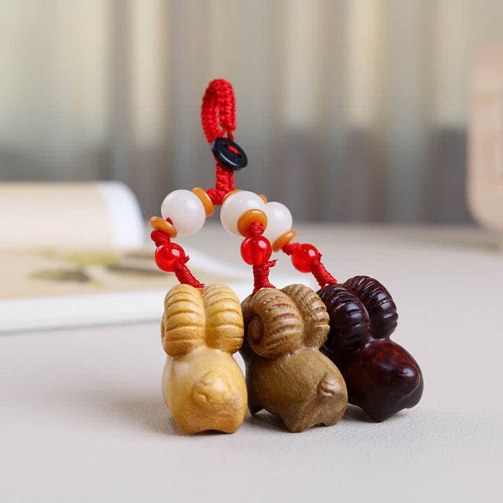 Buddha Stones Hand-Carved Sandalwood Ebony Wood Three Goats Prosperity Keychains - image 4