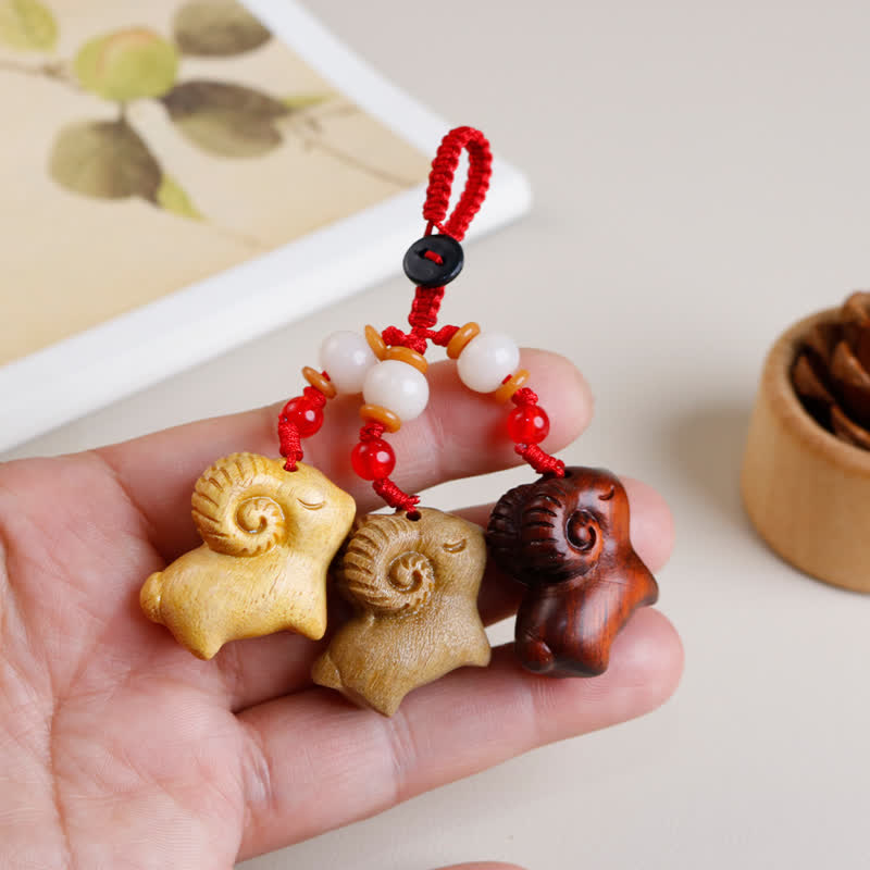 Buddha Stones Hand-Carved Sandalwood Ebony Wood Three Goats Prosperity Keychains - image 5