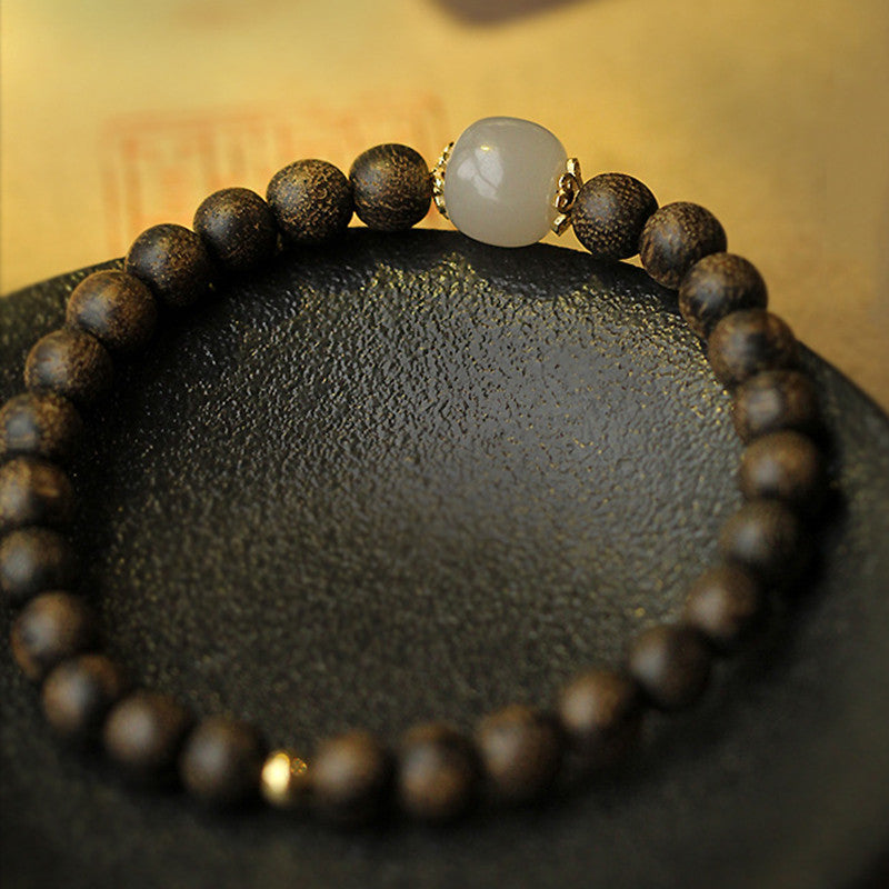 Buddha Stones Agarwood Jade Strength Calm Bracelet