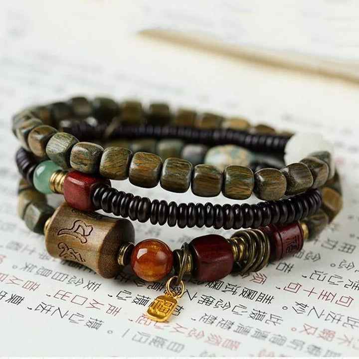 Buddha Stones Green Sandalwood Ebony Om Mani Padme Hum Engraved Peace Triple Wrap Bracelet