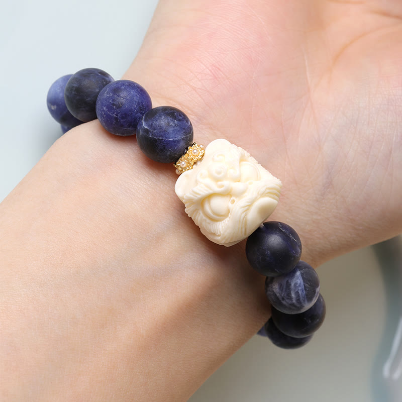 Buddha Stones Sodalite Ivory Fruit Dancing Lion Crescent Moon Harmony Bracelet