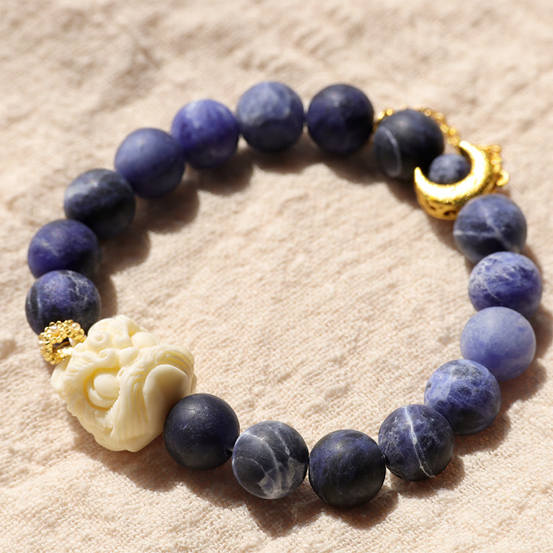 Buddha Stones Sodalite Ivory Fruit Dancing Lion Crescent Moon Harmony Bracelet