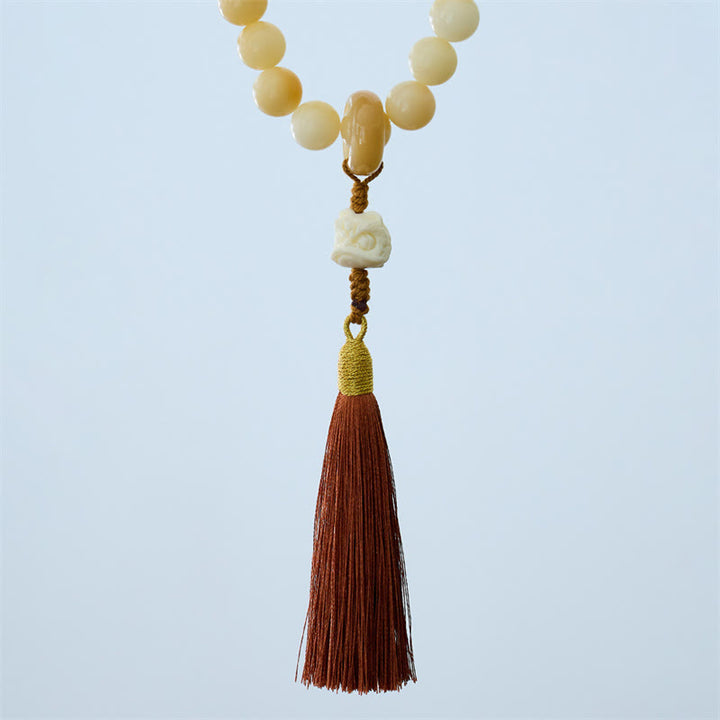 Buddha Stones Natural Bodhi Seed Ivory Fruit Dancing Lion Charm Harmony Tassel Wrist Mala