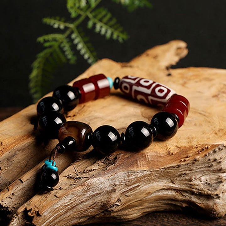 Tibetan Nine-Eye Dzi Bead Black Onyx Wealth Protection Bracelet