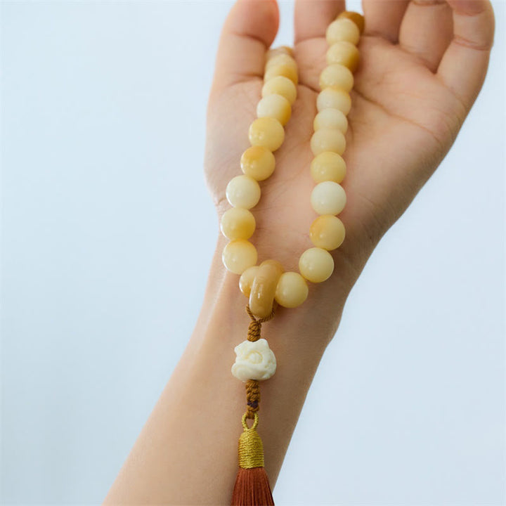 Buddha Stones Natural Bodhi Seed Ivory Fruit Dancing Lion Charm Harmony Tassel Wrist Mala