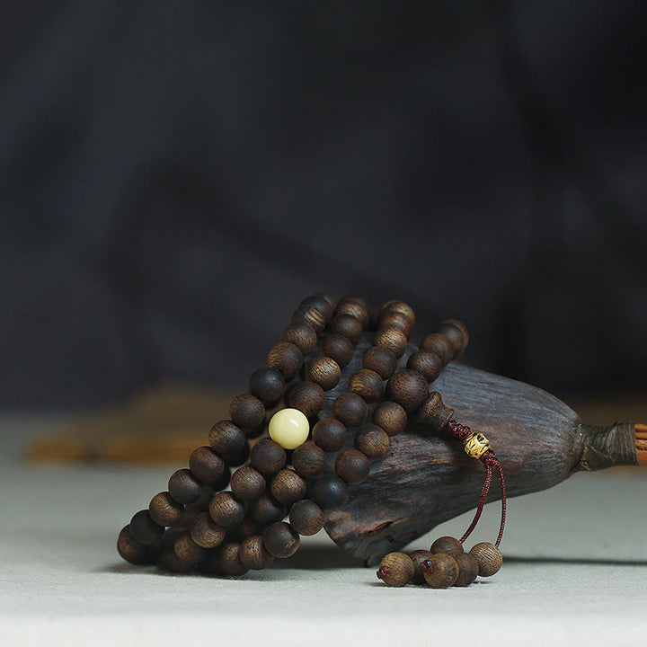 Buddha Stones 999 Gold Tarakan 108 Mala Beads Agarwood Amber Ward Off Evil Spirits Bracelet