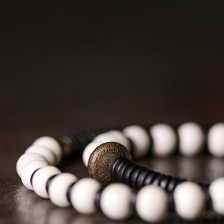 Buddha Stones Yak Bone Ebony Wood Copper Strength Couple Bracelet