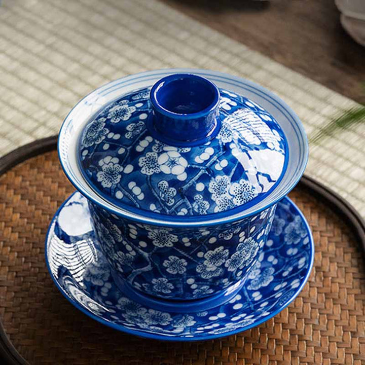 Buddha Stones Plum Blossom Blue And White Porcelain Ceramic Gaiwan Sancai Teacup Kung Fu Tea Cup And Saucer With Lid 185ml