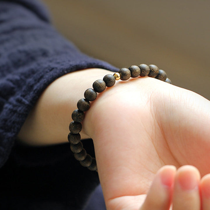 Buddha Stones Agarwood Jade Strength Calm Bracelet