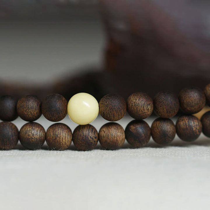 Buddha Stones 999 Gold Tarakan 108 Mala Beads Agarwood Amber Ward Off Evil Spirits Bracelet