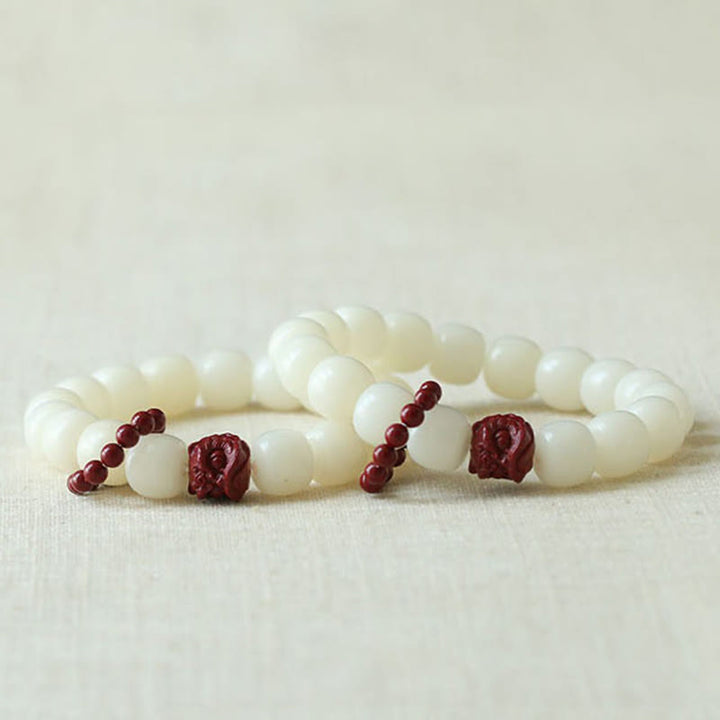 Buddha Stones Natural Bodhi Seed Cinnabar Dancing Lion Charm Wisdom Harmony Wrist Mala