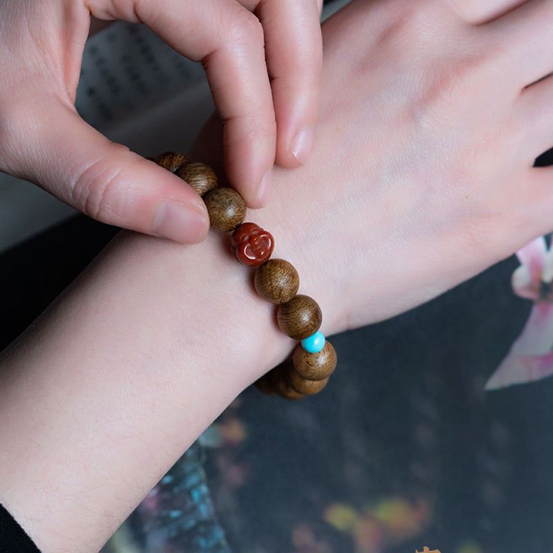 Tarakan Agarwood Amber Red Agate Laughing Buddha Strength Meditation Bracelet