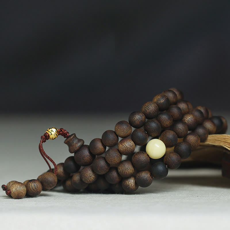 Buddha Stones 999 Gold Tarakan 108 Mala Beads Agarwood Amber Ward Off Evil Spirits Bracelet