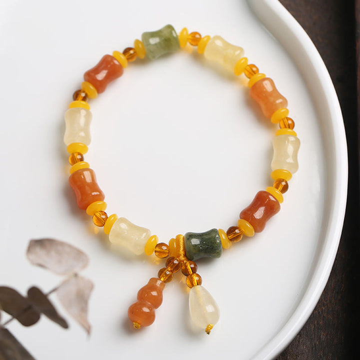 Natural Golden Silk Jade Gourd Wealth Charm Bracelet