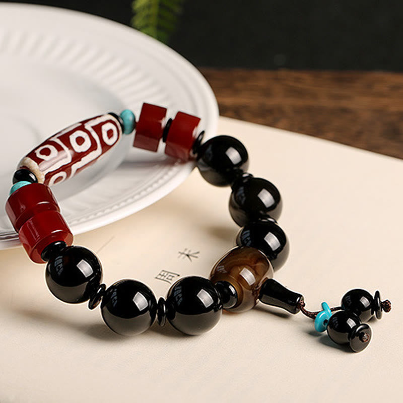 Tibetan Nine-Eye Dzi Bead Black Onyx Wealth Protection Bracelet